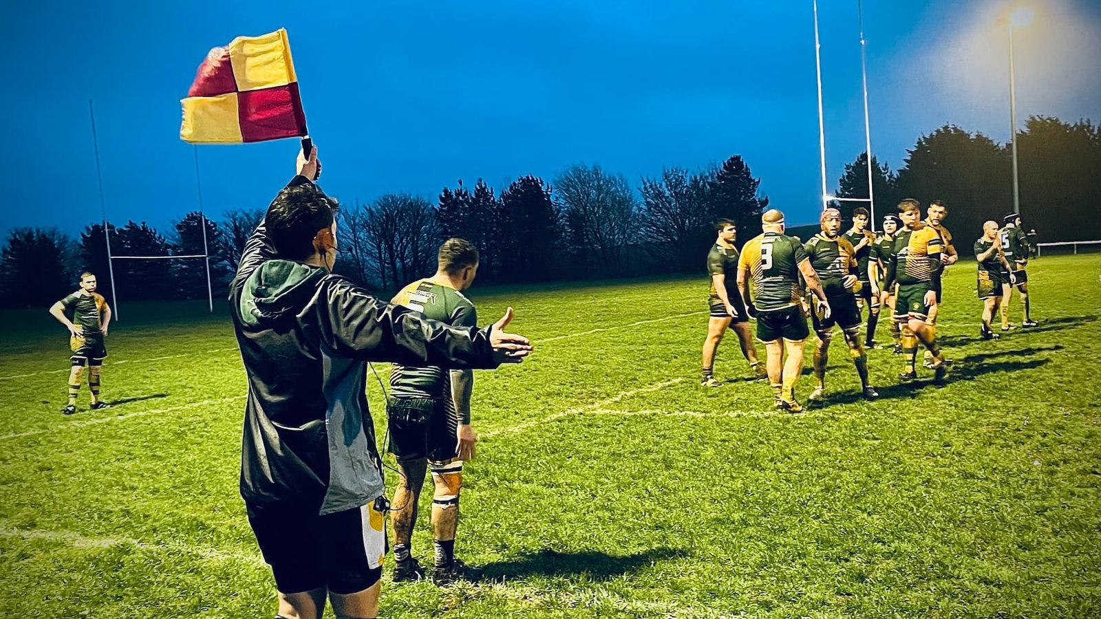A game of rugby at a wintery night with a PRRS assistance referee